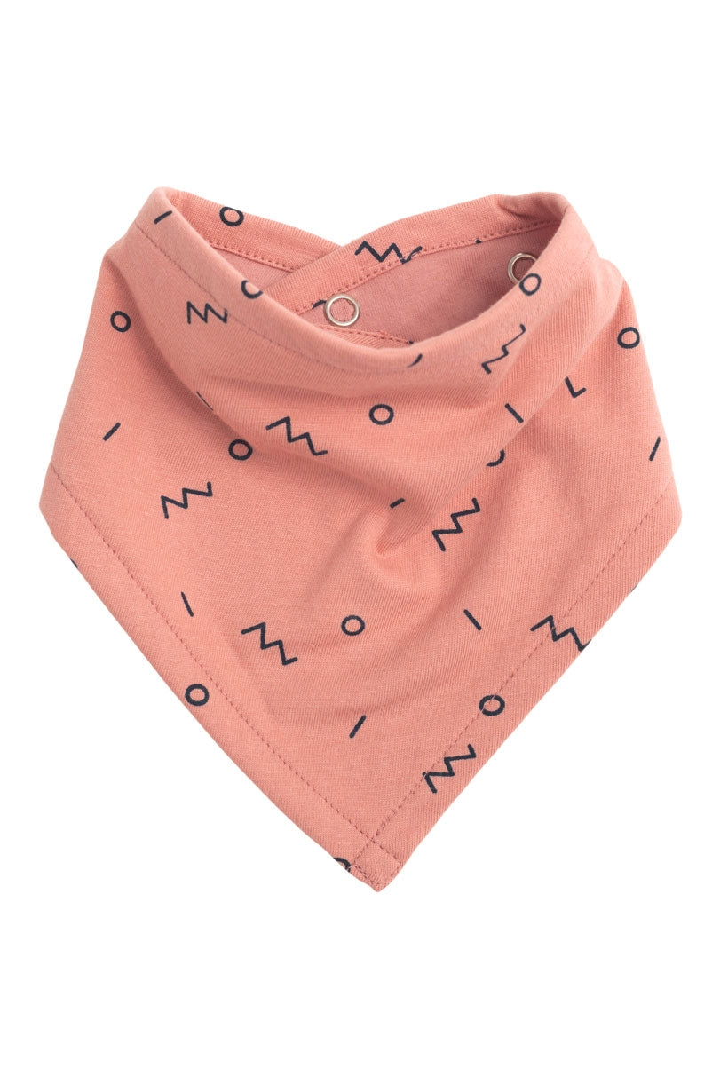 Babero reversible rosa con estampado abstracto