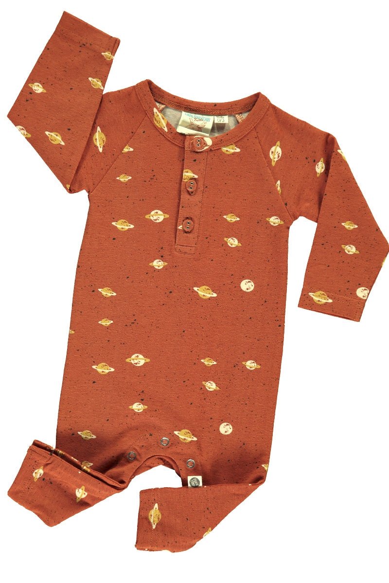 Baby long sleeve jumpsuit in terracotta and Saturn print