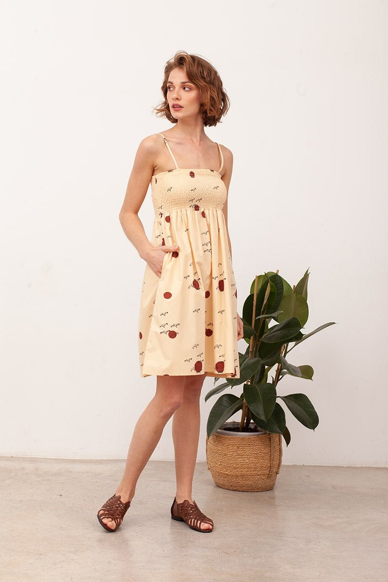 BETH's smocked dress in beige