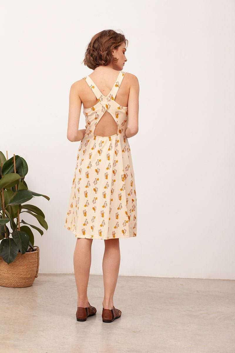 BETTY's cross back dress in Beige