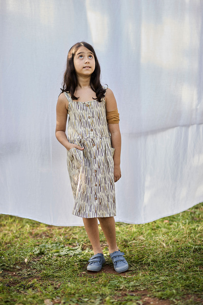 Cross Back Dress in Organic Cotton with jungle print in Beige