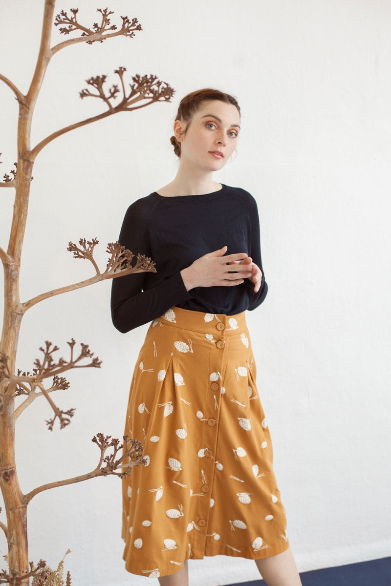 Falda midi Neia estampado piñas.