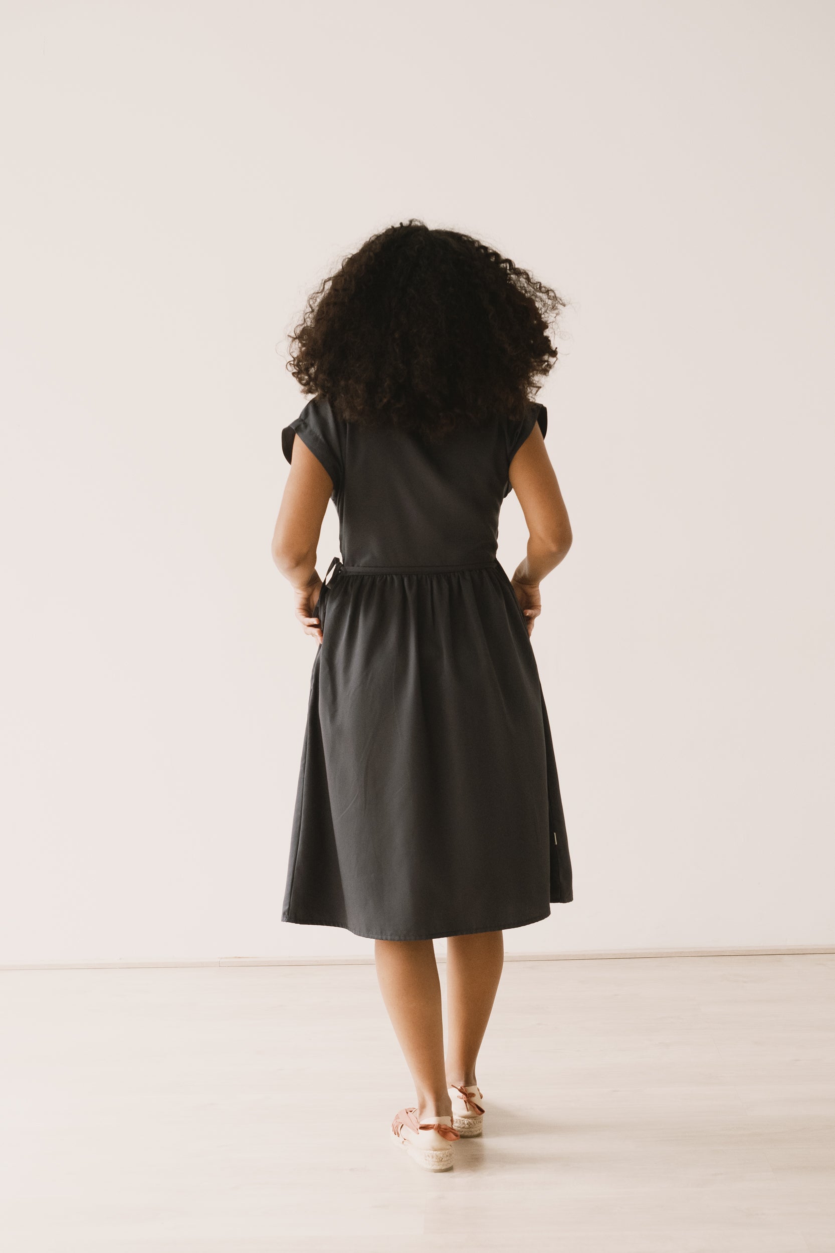 Hira TENCEL™ wrap midi dress in black