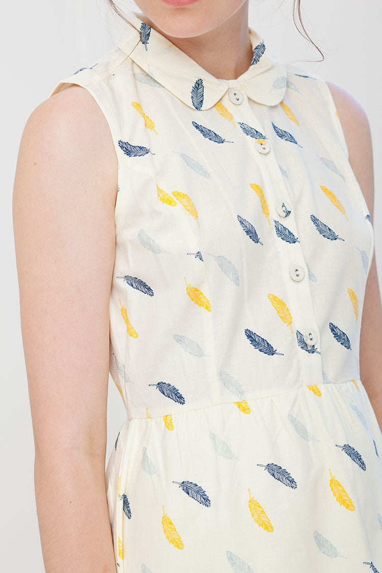 Ina dress with feathers print.