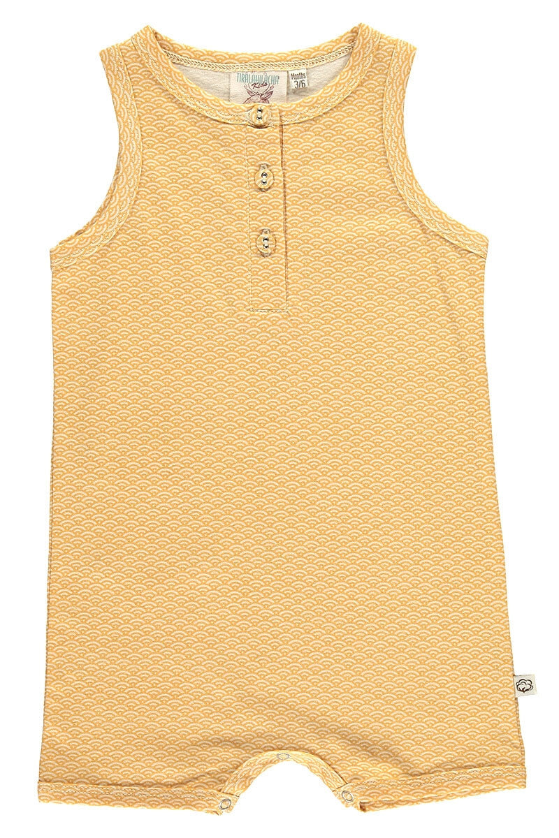 Organic baby jampsuit in honey yellow and abstract print