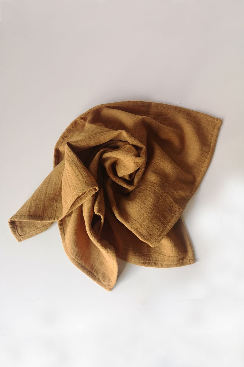 Pañuelo muselina teja