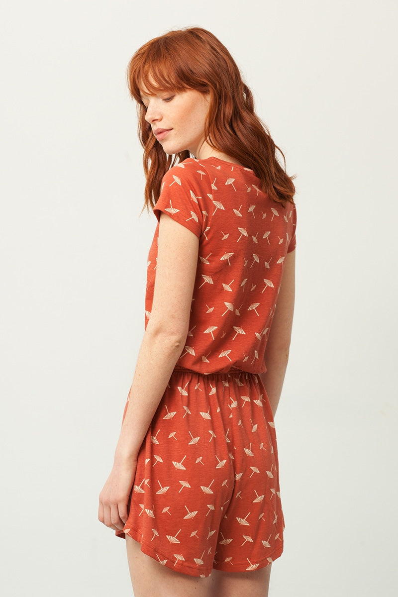 Pia jumpsuit in terracotta and unbrella print
